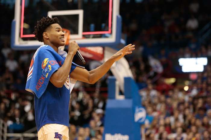 Kansas senior guard Ochai Agbaji speaks to the crowd for senior day after Saturday's game against Texas inside Allen Fieldhouse.